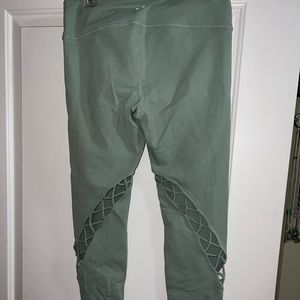Mint green Alo Yoga criss cross leggings
